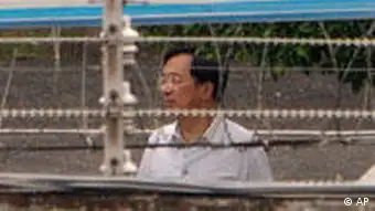 Taiwan former President Chen Shui-bian is seen behind barbed-wire at the Tucheng Detention Center in Taipei County, Taiwan, Friday, Sept. 11, 2009. In a sign of protest Chen refused to be in court Friday when his verdict was to be announced in his high-profile corruption trial. (AP Photo) ** TAIWAN OUT **