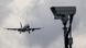 A plane lands at Gatwick with camera at the forefront A plane lands at Gatwick with camera at the forefront