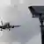 A plane lands at Gatwick with camera at the forefront