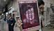 A protester in 2018 hold an image of jailed Chinese human rights lawyer Wang Quanzhang A protester in 2018 hold an image of jailed Chinese human rights lawyer Wang Quanzhang