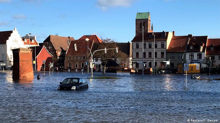 The storm flooded streets and squares in the old town near the harbor of Wismar in northern Germany.