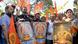 Hindu traditionalists, including one woman, hold up placards with the image of celibate deity Ayyappa Hindu traditionalists, including one woman, hold up placards with the image of celibate deity Ayyappa