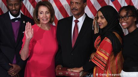 US congresswoman Ilhan Omar takes her oath on a Quran