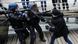 Protester Christopher D. punches police officers in Paris during yellow vest protest Protester Christopher D. punches police officers in Paris during yellow vest protest