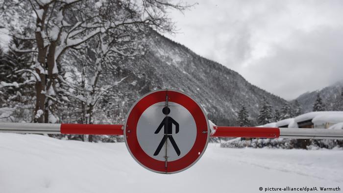 A sign warning people to not cross into a snow area in southern Bavaria