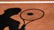 Schatten von einem Tennisspieler Schatten von einem Tennisspieler