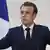 Macron gestures with both hands during a January speech in Paris