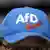 The AfD logo on a baseball hat