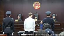 Canadian Robert Lloyd Schellenberg appears in court for a retrial of his drug smuggling case in Dalian, Liaoning province, China, January 14, 2019, in this handout picture received by Reuters January 15, 2019. Intermediate People's Court of Dalian/Handout via REUTERS ATTENTION EDITORS - THIS IMAGE WAS PROVIDED BY A THIRD PARTY. NO RESALES. NO ARCHIVE.
