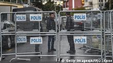 Turkish police officers stand guard behind fences at the Saudi Arabian consulate on January 10, 2019 during a demonstration in Istanbul. - Amnesty International called on January 10 for an international investigation on the murder of Saudi columnist Jamal Khashoggi, during a ceremony in front of the Saudi consulate in Istanbul marking the 100th day of his murder that sparked global outrage. (Photo by OZAN KOSE / AFP) (Photo credit should read OZAN KOSE/AFP/Getty Images)