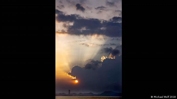 sun breaks through clouds (Michael Wolf 2018)