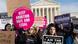 Pro-choice and anti-abortion activists hold up signs in a "March for Life" event in Washington DC Pro-choice and anti-abortion activists hold up signs in a "March for Life" event in Washington DC