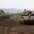 Israeli army Merkava tanks gather in the Israeli-annexed Golan Heights