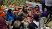 Lakshmi Narayan Tripathi, chief of the Kinnar Akhara congregation for transgender people, sings with her followers during Kumbh Mela, or the Pitcher Festival, in Prayagraj, previously known as Allahabad, India, January 14, 2019. REUTERS/Danish Siddiqui