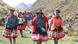 Peruvian villagers walking in the Andes Peruvian villagers walking in the Andes