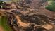 A river of mud flows through a low lying area following a dam break in Brazil A river of mud flows through a low lying area following a dam break in Brazil