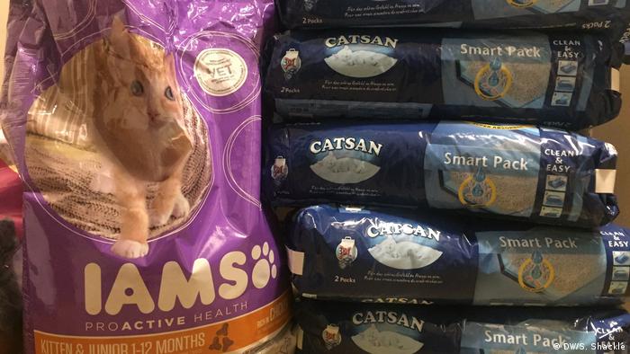 Bags of cat food and kitty litter