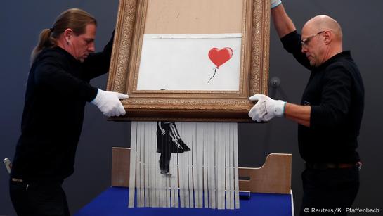 Banksy's Mediterranean 'triptych' sells for $2.3 million – DW – 07