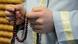An imam holds prayer beads An imam holds prayer beads