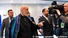 Former Afghan president Hamid Karzai arrives to attend a two-day gathering of the Taliban and Afghan opposition representatives at the President Hotel in Moscow on February 5, 2019. (Photo by Yuri KADOBNOV / AFP) (Photo credit should read YURI KADOBNOV/AFP/Getty Images)