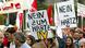 Protesters carry signs against Hartz IV in Berlin Protesters carry signs against Hartz IV in Berlin
