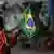 Criança venezuelana segura bandeira brasileira em Roraima: porta de entrada para refugiados