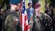 A US soldier holds the US flag during the final rehearsal of a parade prior to Polish Armed Forces Day A US soldier holds the US flag during the final rehearsal of a parade prior to Polish Armed Forces Day