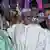 Vor Wahlen in Nigeria  Muhamadu Buhari (M), Präsident von Nigeria, und Atiku Abubakar (r)