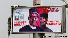 An election campaign billboard depicting Nigerian President Muhammadu Buhari and his Vice President, Yemi Osinbajo