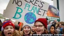 Pupils carry a banner reading There's no planet B during the Fridays for Future protest against coal and for climate protection, on January 25, 2019 in Berlin where the coal commission meets. - The so-called Kohlekommission (coal commission), a governmental commission for growth, structural change and employment is to announce a roadmap for exiting coal as part of efforts to make Germany carbon-neutral by 2050. (Photo by Odd ANDERSEN / AFP) (Photo credit should read ODD ANDERSEN/AFP/Getty Images)