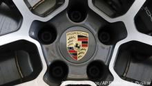 This is the Porsche logo on a wheel on a 2019 Porsche Macan automobile on display at the 2019 Pittsburgh International Auto Show in Pittsburgh Thursday, Feb. 14, 2019. (AP Photo/Gene J. Puskar) |