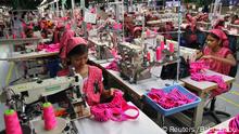 Workers produce bras for export at a factory in Kanchipuram district, 30 km (18 miles) south of the India's southern city of Chennai, May 22, 2012. REUTERS/Babu