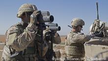In this Nov. 1, 2018, photo released by the U.S. Army, soldiers surveil the area during a combined joint patrol in Manbij, Syria. The United States’ main ally in Syria on Thursday, Dec. 20, 2018, rejected President Donald Trump’s claim that Islamic State militants have been defeated and warned that the withdrawal of American troops would lead to a resurgence of the extremist group. (U.S. Army photo by Spc. Zoe Garbarino via AP) |