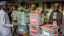 Electoral commission officers prepare ballot boxes before the polling station opens at Shagari Health Unit polling station in Yola, Adamawa State, Nigeria on February 23, 2019, the day of the general elections. - Nigerians began voting for a new president on February 23, after a week-long delay that has raised political tempers, sparked conspiracy claims and stoked fears of violence. Some 120,000 polling stations began opening from 0700 GMT, although there were indications of a delay in the delivery of some materials and deployment of staff, AFP reporters said. (Photo by Luis TATO / AFP) (Photo credit should read LUIS TATO/AFP/Getty Images)