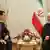 Suriye Devlet Başkanı Beşar Esad ve İran Cumhurbaşkanı Hasan Ruhani (sağda)