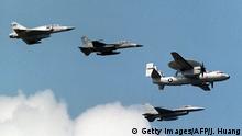 TAIPEI, TAIWAN - AUGUST 6: Picture dated 02 October 1998 shows four types of Taiwan's second generation air force fleet, (from L to R), French-made Mirage 2000-5, locally-made IDF (Indigenous Defense Figher), E-2T early warning system and US-made F-16. Taiwan's air force authorities have asked nationalist pilots to impose self-restraint to avoid clashing with Chinese jets over the Taiwan Strait amid cross-strait military tensions. AFP PHOTO (Photo credit should read JAMES HUANG/AFP/Getty Images)