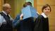 Klaus O., who poisoned his colleagues' sandwiches with lead, hides his face at this trial in Bielefeld, Germany Klaus O., who poisoned his colleagues' sandwiches with lead, hides his face at this trial in Bielefeld, Germany