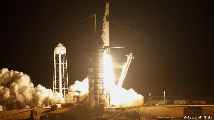 A SpaceX Falcon 9 rocket, carrying the Crew Dragon spacecraft, lifts off on an uncrewed test flight to the International Space Station from the Kennedy Space Center in Cape Canaveral, Florida, US.