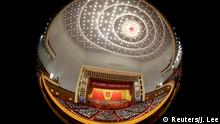 Delegates attend the opening session of the National People's Congress (NPC) at the Great Hall of the People in Beijing, China, March 5, 2019. Picture taken with a fisheye lens. REUTERS/Jason Lee TPX IMAGES OF THE DAY