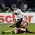 Germany's Philipp Lahm, front, fights for the ball with Russia's Vladimir Bystrov