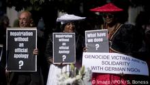 29.08.2018 ***Demo Herero and Nama, Berlin DEU, Deutschland, Germany, Berlin, 29.08.2018 Demonstranten mit Plakaten What have we Done und Repatriation without an official apology bei der Kundgebung gegen die Ausgrenzung von Mitglieder aus Namibia anlaesslich der Rueckgabe von Gebeinen nach Namibia waehrend deines Gedenkgottesdienstes der EKD und der namibischen Partnerkirchen und Zeremonie vor der Franzoesischen Friedrichstadtkirche in Berlin. Das Gedenken ist zur Erinnerung an die afrikanischen Opfer von Versklavung, Kolonialismus und rassistischer Gewalt. Im Hintergrund steht die Forderung nach Anerkennung der Verbrechen gegen Schwarze Menschen und Menschen afrikanischer Herkunft Nachdruck zu verleihen. Die von Deutschland an den Herero und Nama begangenen Voelkermorde in Namibia und die Kriegsverbrechen in Tansania im Maji- Maji-Krieg warten immer n 