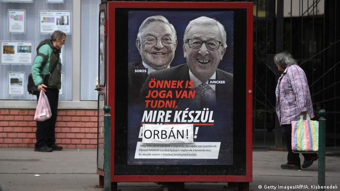Plakat na kojem su George Soros i Jean-Claude Juncker
