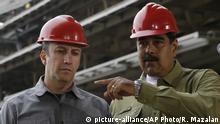 Venezuela's President Nicolas Maduro and Vice President Tareck El Aissami, tour La Rinconada baseball stadium that is under construction, on the outskirts of Caracas, Venezuela, Saturday, May 19, 2018. Maduro is seeking a new six-year mandate — and despite crippling hyperinflation and widespread shortages of food and medicine, he is widely expected to win Sunday's election. (AP Photo/Ricardo Mazalan) |