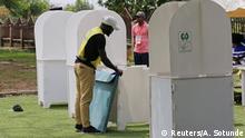 Independent National Electoral Commission (INEC) worker packs up voting booths after the polls closed during the Nigeria's governorship and state assembly election at the Gwarinpa ward in Abuja, Nigeria March 9, 2019. REUTERS/Afolabi Sotunde