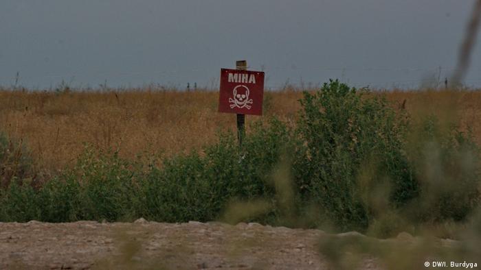 Знак, предупреждающих о наличии мин на этой территории