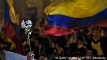 People protest against a reform proposed by the government for the Special Jurisdiction for Peace (JEP) in Bogota, Colombia, on March 18, 2019. (Photo by Raul ARBOLEDA / AFP) (Photo credit should read RAUL ARBOLEDA/AFP/Getty Images)