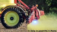 French farmer Nicolas Denieul sprays glyphosate herbicide produced by US agrochemical giant Monsanto on May 11, 2018, on a field of no-till corn in Piace, northwestern France. - Using a 10-year old conservation farming practice, French farmer Nicolas Denieul has reduced the use of glyphosate to half a litre instead of one litre per hectare and per year. (Photo by Jean-Francois MONIER / AFP) (Photo credit should read JEAN-FRANCOIS MONIER/AFP/Getty Images)