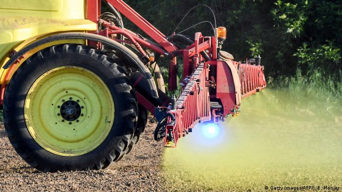 French farmer Nicolas Denieul sprays glyphosate herbicide produced by US agrochemical giant Monsanto