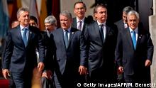 (L to R) Argentina's President Mauricio Macri, Colombia's President Ivan Duque, Peru's President Martin Vizcarra, Brazil's President Jair Bolzonaro, paraguay's President Mario Abdo Benitez and their host Chile's President Sabastian Pinera are pictured at La Moneda presidential palace in Santiago, where they will hold a meeting for the launching of the Prosur regional initiative on March 22, 2019. - The presidents of Chile, Colombia, Argentina, Brazil, Ecuador, Peru and Paraguay meet to put an end to their membership in the Unasur, whose participation is suspended since 2018, and announce the birth of a new regional initiative created under rightwing governments of the region to promote development projects in South America. (Photo by MARTIN BERNETTI / AFP) (Photo credit should read MARTIN BERNETTI/AFP/Getty Images)