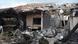 A damaged house that was hit by a rocket A damaged house that was hit by a rocket